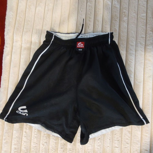 Caan kids football sports set like new, reversible black and white