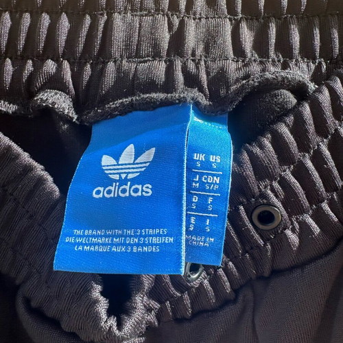 Adidas Originals women's black sweatpants with camouflage stripes like new