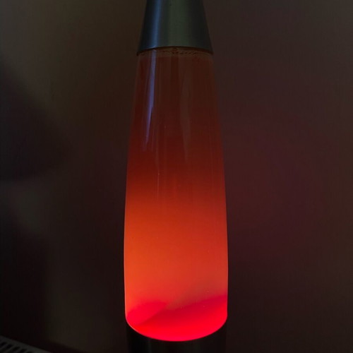 Lava lamp used in excellent condition with slight cloudiness