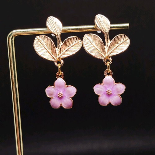 Handmade earrings with purple iridescent flowers
