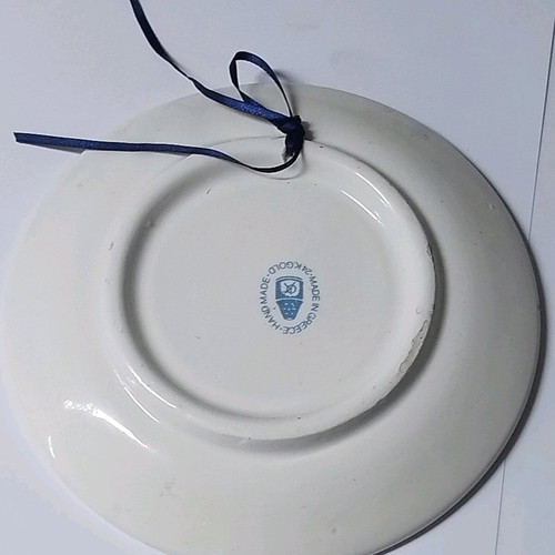 Decorative plate used from Karpathos porcelain with 24k gold detail