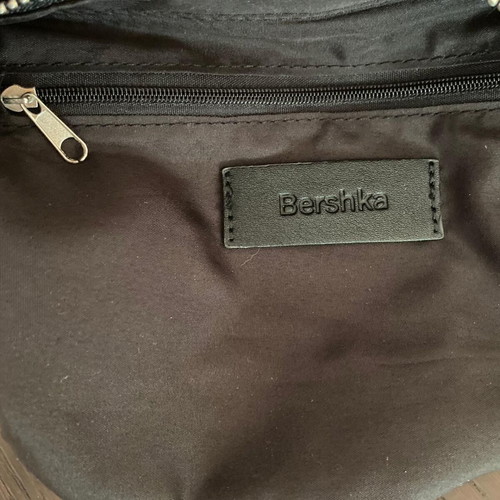 Bershka black shoulder bag used with metal butterfly detail