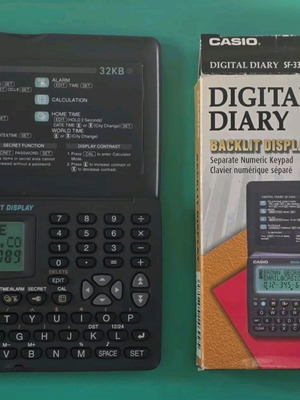 Casio Digital Diary SF-3300 like new vintage electronic organizer with Philip Morris box