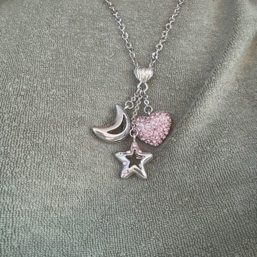 Silver necklace like new with three pendants heart, star and moon