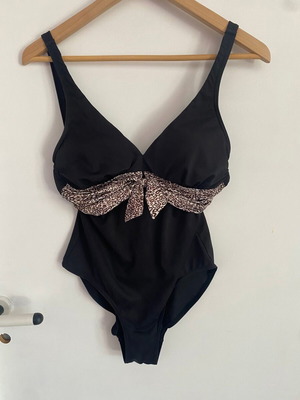Ladies black one-piece swimsuit with animal print, size medium