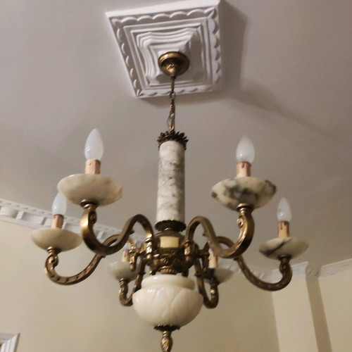 Vintage chandelier used, made of bronze and natural stone