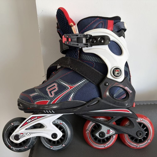 Fila roller skates refurbished with laces, velcro, and ankle buckle