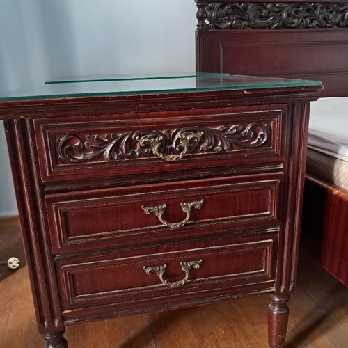Wooden vintage bedroom furniture set used with signs of wear