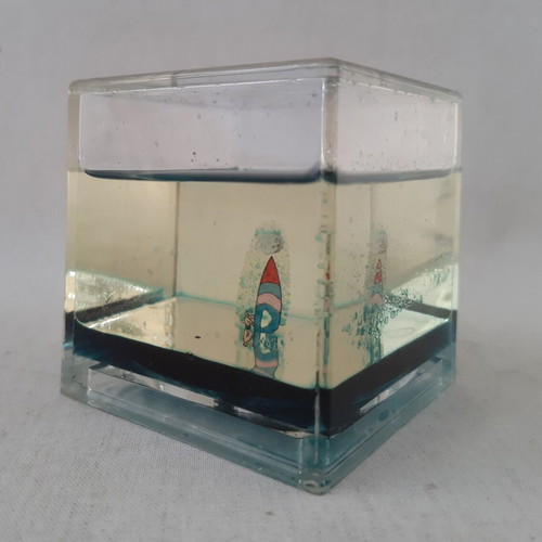 Water decoration with floating sailboat used