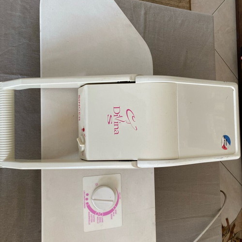 Singer Divina press used, fully functional, with spare parts