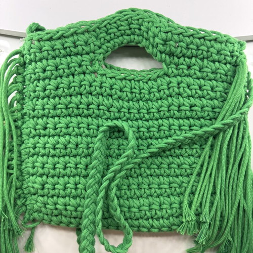 Handmade green crochet bag with fringes