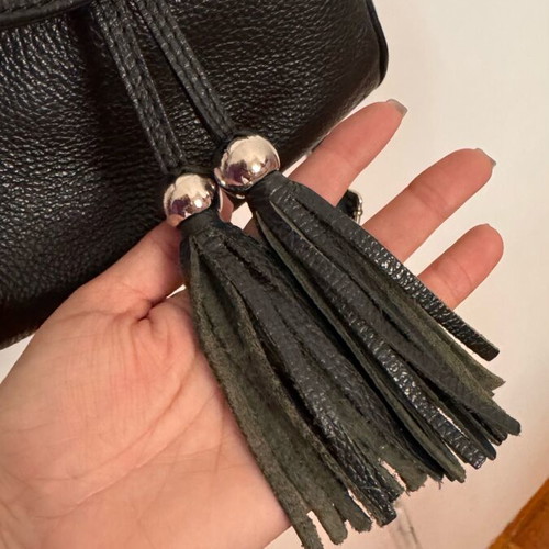 Leather backpack black like new with zipper pockets and magnetic clasp
