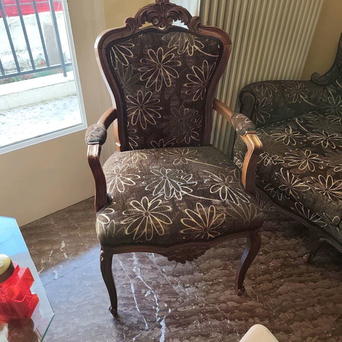 Classic living room refurbished with sofa, armchairs, chairs and marble tables