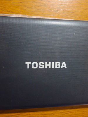 Toshiba laptop used, black, 13-inch, AMD E-Series, 2GB RAM, HDD, Windows