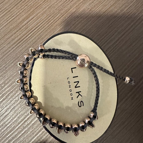 Links Of London collectible bracelet like new, rose gold and black cord
