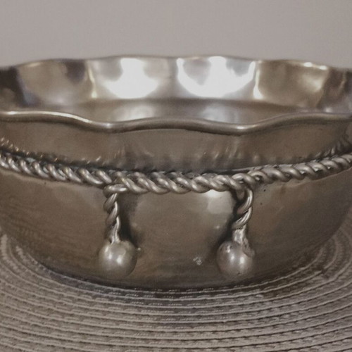 Metal decorative item used with perimeter detail