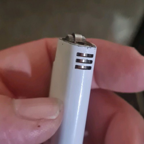 Metallic white mini lighter cases used, BiC type
