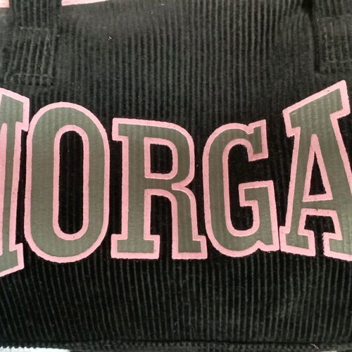 Morgan hand bag like new, corduroy black and pink
