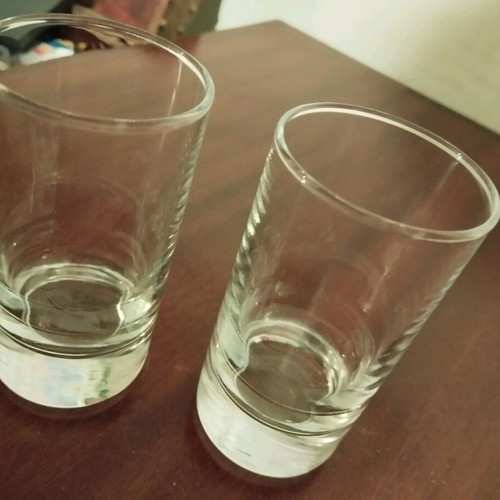 Metal cafe-style coaster used, for small glasses