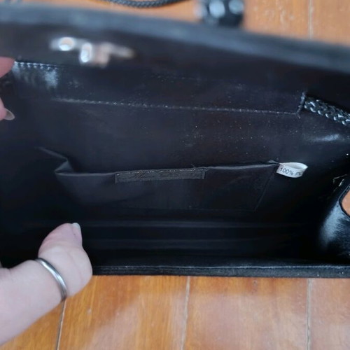 Shoulder bag like new, black with cord and button