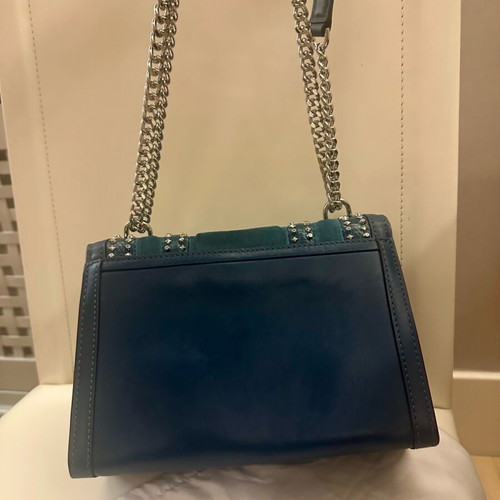Michael Kors blue crossbody bag like new with studs