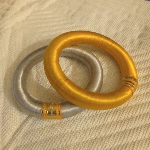 Set of 2 bracelets used, 6.5cm inner width