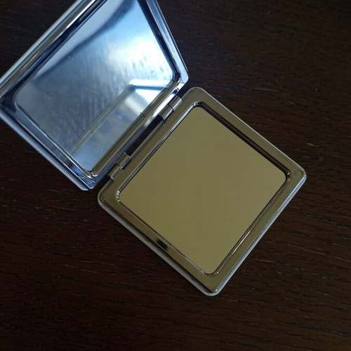 Compact Mirror new with multicoloured daisies