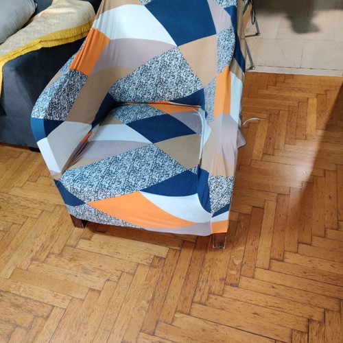 Armchair used made of good wood with fabric cover