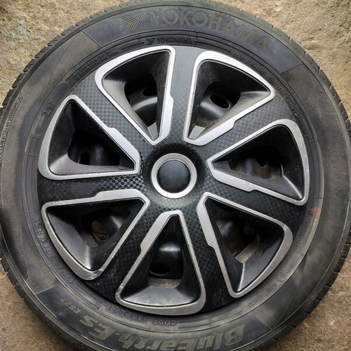 Yokohama tires 175/65/14 with steel rims and hubcaps like new