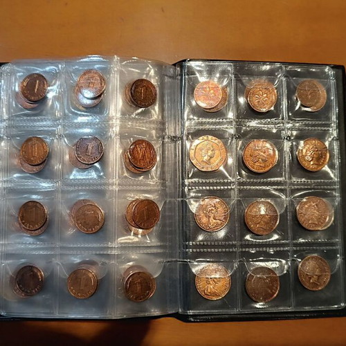 Album of 120 collectible coins from 7 countries