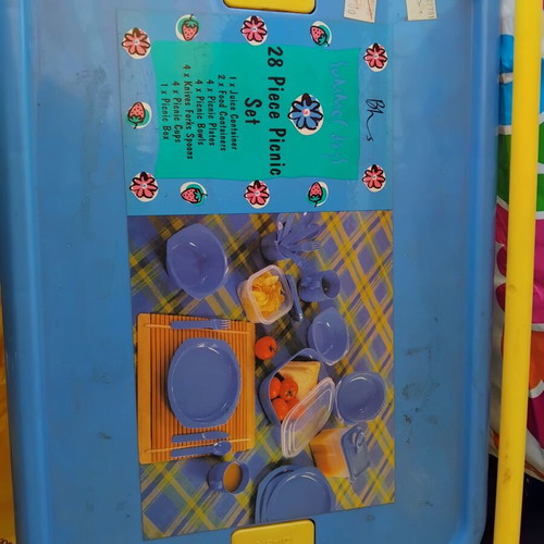Picnic set like new with 8 knives, forks, spoons, plates, glasses, bowls, and containers