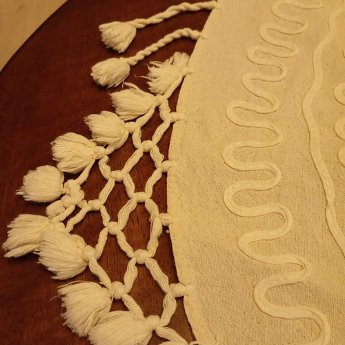 Vintage round tablecloth 81x87 with embossed cordonetto and tassels, used