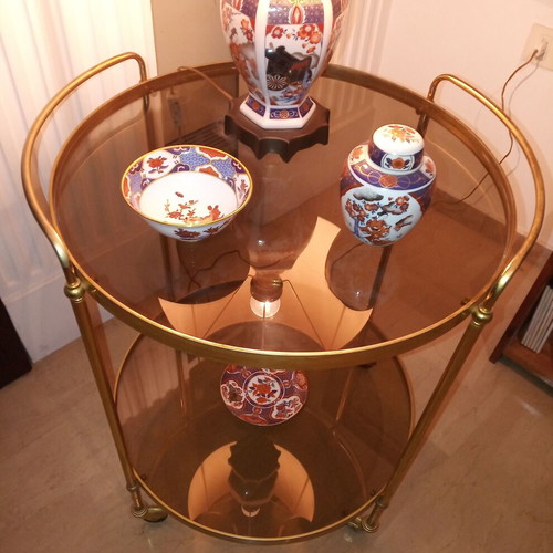 Bronze wheeled furniture like new, bar cart with glass surfaces