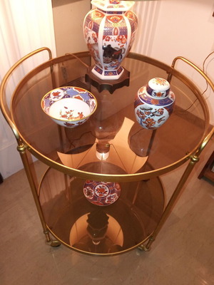 Bronze wheeled furniture like new, bar cart with glass surfaces