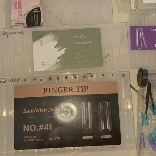 Nail products set like new with dual forms, tips, and accessories