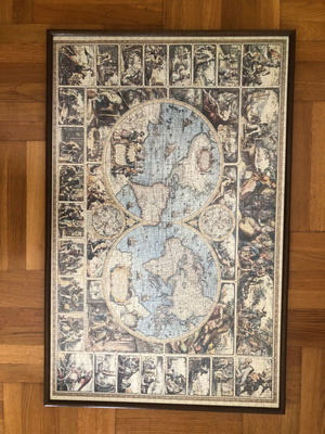 World puzzle with frame used, brown color and glass
