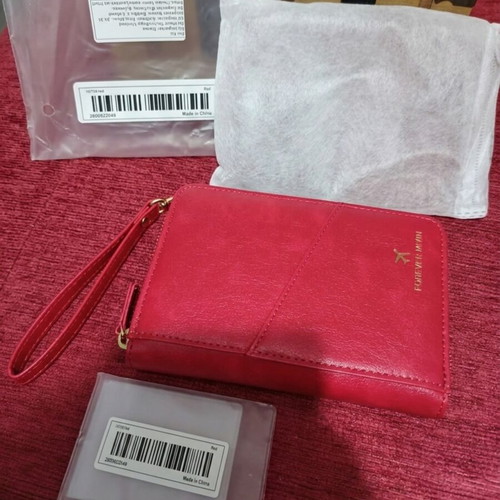 Passport holder new with zipper and wrist strap red