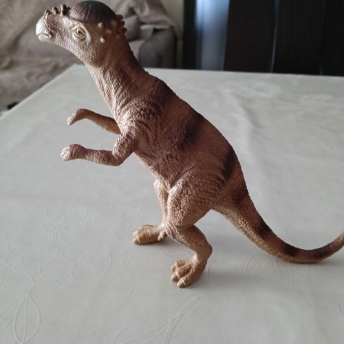 Set of 24 dinosaur figures in various sizes