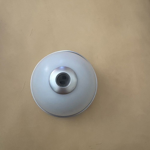 Alarm clock with light used, projects time on ceiling