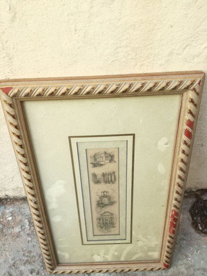 Retro engraving 1950 with handmade wooden carved frame used with wear