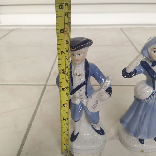 Vintage musical couple figurine with blue clothes like new