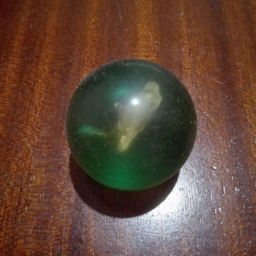 Vintage rubber ball used with transparent and blue colors and dolphin