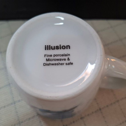 Illusion porcelain mug used