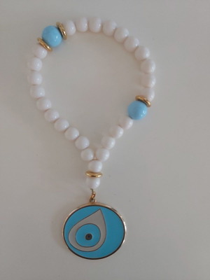 Souvenir used with beads and blue eye charm