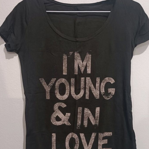 Black T-shirt used, size S, with faded letters