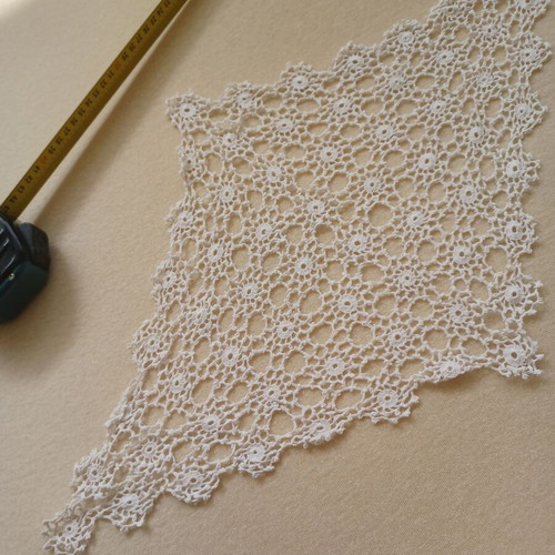 Handmade lace in rhombus shape used