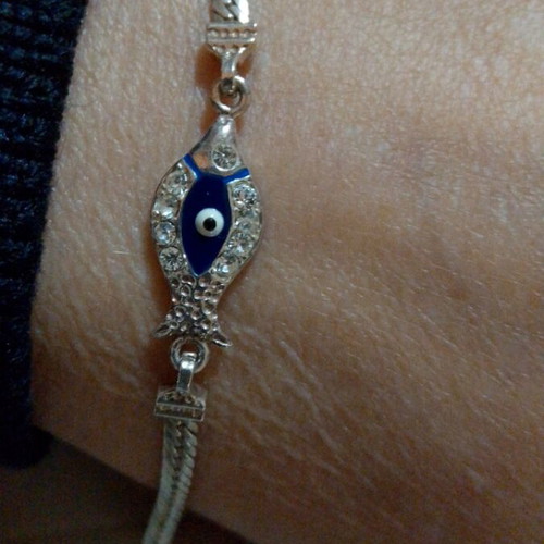 Silver 925 bracelet like new with blue eye and stones