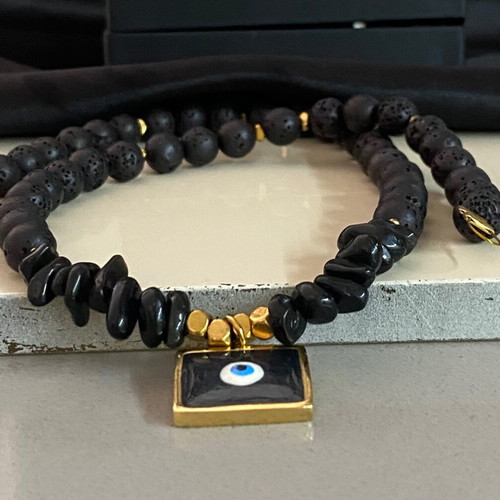 Handmade necklace with black lava stones and protective eye new