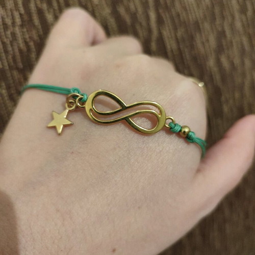 Bracelet new with gold infinity and star element, turquoise