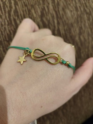 Bracelet new with gold infinity and star element, turquoise